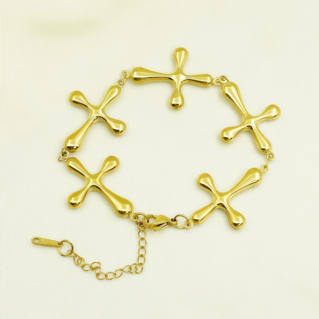 Cross border stainless steel hollow 18k gold cross bracelet from Europe and America